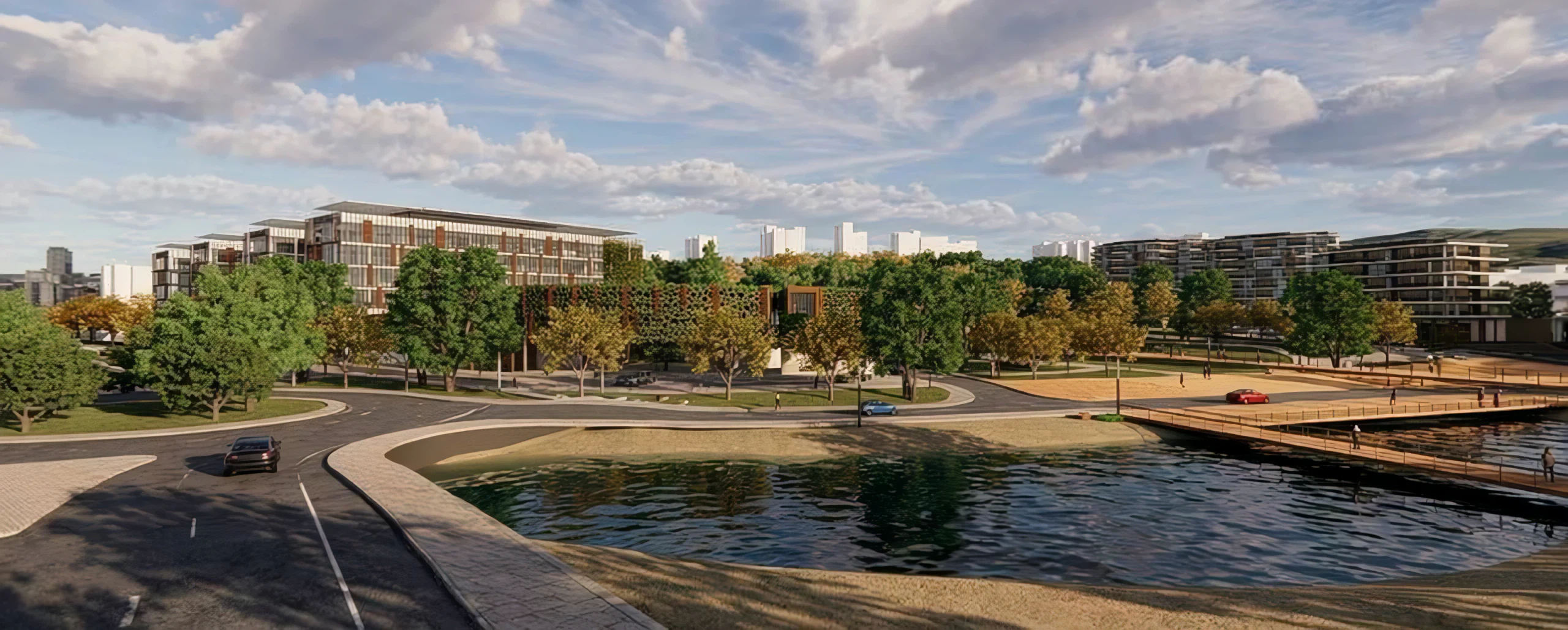 Tracking shot along the lake edge: the office building with its planted façade beyond, the timber deck and the river beach to the right.